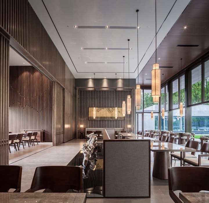 休閑茶樓裝修效果圖—現代門(mén)樓，曲折圓潤的中式藝術(shù)裝置